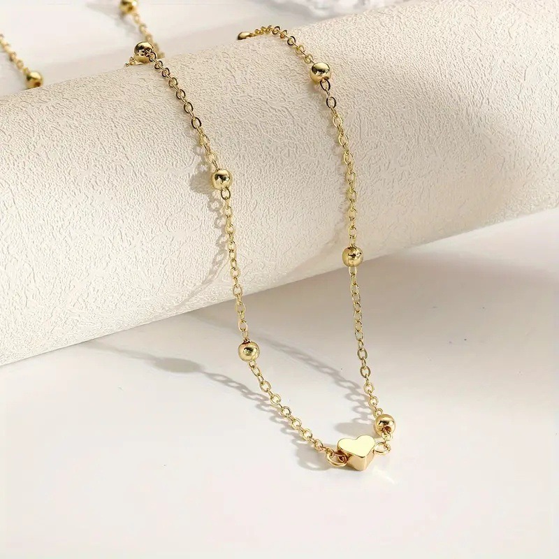 繊細なゴールドのハート型ウエストチェーン、ビーズ付きのボディ - Body Jewelry のレビューと価格